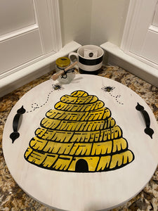 Bee’s Knees Collection ~ BEE Hive Serving Tray This 18” round white washed Bee’s Knees Collection BEE HIVE SERVING TRAY is a great addition to your Kitchen or Patio.  Design in Chalkology Paste Black Velvet and Bumblebeesealed in Wise Owl (Food Safe) Furniture Tonic